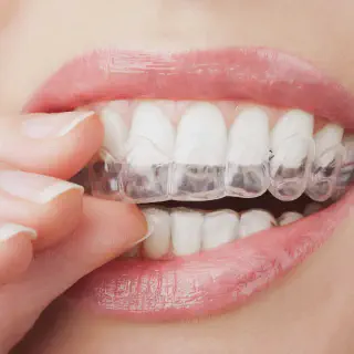 /img/25197-dentist-checkup.webp